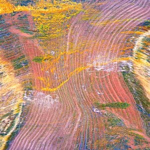 A three exposure merged photograph of a farm field seen from above