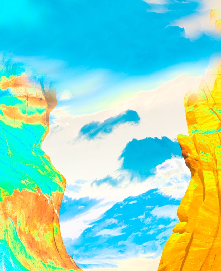 Abstract desert canyon scene with towering golden rock forms on either side framing a bright blue sky with soft clouds, rendered in saturated turquoise, yellow, and orange tones with painterly textures.
